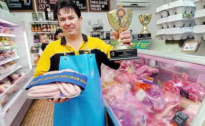 Zac’s Meats’ Stephen Austin with his top-placed pork sausages. Zac’s Meats’ Stephen Austin with his top-placed pork sausages.