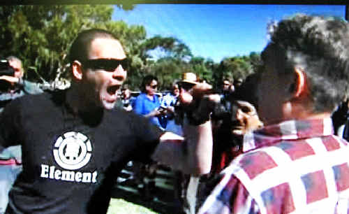 Greens candidate Joe Ebono is confronted by an angry fisherman at the rally in Tweed Heads on Saturday. Greens candidate Joe Ebono is confronted by an angry fisherman at the rally in Tweed Heads on Saturday.