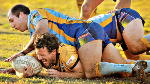 Caloundra’s Wade Grayson goes over next to the posts as Gympie’s Darren Burns comes over the top. After a tentative start from both teams, Caloundra survived a late resurgence from Gympie to claim the minor premiership and the Billy Moore Cup. The Devils can only reflect on what could have been as the club missed out on winning its first minor premiership. Caloundra’s Wade Grayson goes over next to the posts as Gympie’s Darren Burns comes over the top. After a tentative start from both teams, Caloundra survived a late resurgence from Gympie to claim the minor premiership and the Billy Moore Cup. The Devils can only reflect on what could have been as the club missed out on winning its first minor premiership.