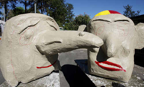 The papier-mache heads of Julia Gillard and Tony Abbott due to ride on the Murwillumbah Central Rotary float in Tweed Banana Festival street parade. The papier-mache heads of Julia Gillard and Tony Abbott due to ride on the Murwillumbah Central Rotary float in Tweed Banana Festival street parade.