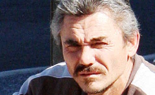 Dean Samuel Flavell is accused of threatening his neighbour with an axe over her noisy rooster. Dean Samuel Flavell is accused of threatening his neighbour with an axe over her noisy rooster.