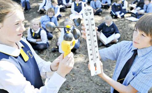 Warm and sunny: Clarence Valley Anglican School students, Shannon McFarlane and Angus Woods, take a reading. Warm and sunny: Clarence Valley Anglican School students, Shannon McFarlane and Angus Woods, take a reading.