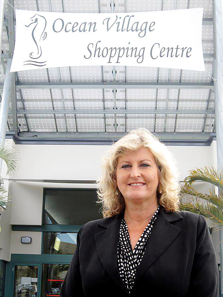 Ocean Village Shopping Centre manager Veronica O’Dwyer under the solar panel structure. Ocean Village Shopping Centre manager Veronica O’Dwyer under the solar panel structure.