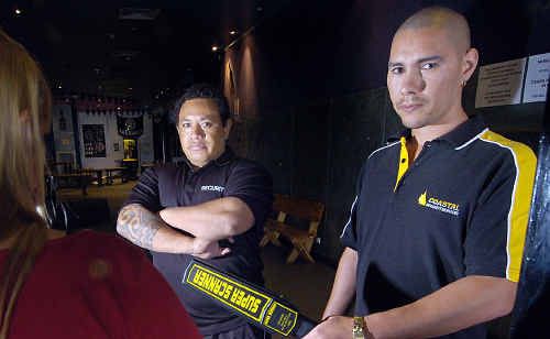 Rumaz nightclub owner Mark Vakauta looks on as head of security Jeff McDermott scans a patron. Rumaz nightclub owner Mark Vakauta looks on as head of security Jeff McDermott scans a patron.