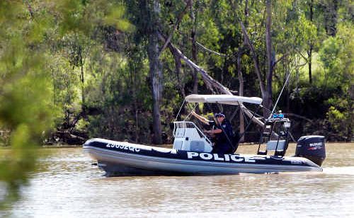 Sergeant Jeff Barnett and Constable Matt Habermann from Gladstone Water Police search the Dawson River near the Neville Hewitt Weir at Baralaba for a missing fencing contractor. Sergeant Jeff Barnett and Constable Matt Habermann from Gladstone Water Police search the Dawson River near the Neville Hewitt Weir at Baralaba for a missing fencing contractor.