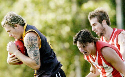 Tweed Coast’s Jason Bolt beats two Lismore Swans rivals to claim a mark in a Summerland AFL game this year. Bolt was the league’s leading goal-kicker this season and looms as a major threat to the Swans in the grand final at Ballina today. Tweed Coast’s Jason Bolt beats two Lismore Swans rivals to claim a mark in a Summerland AFL game this year. Bolt was the league’s leading goal-kicker this season and looms as a major threat to the Swans in the grand final at Ballina today.