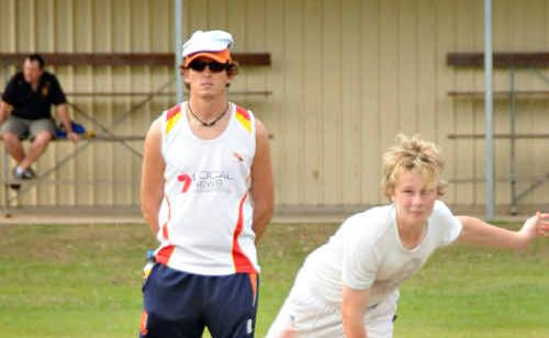 Gympie cricket junior Slatter Mitchell sends down a delivery during a practice match yesterday while Sunshine Coast Scorchers player Eric Szwarczynski looks on. Gympie cricket junior Slatter Mitchell sends down a delivery during a practice match yesterday while Sunshine Coast Scorchers player Eric Szwarczynski looks on.