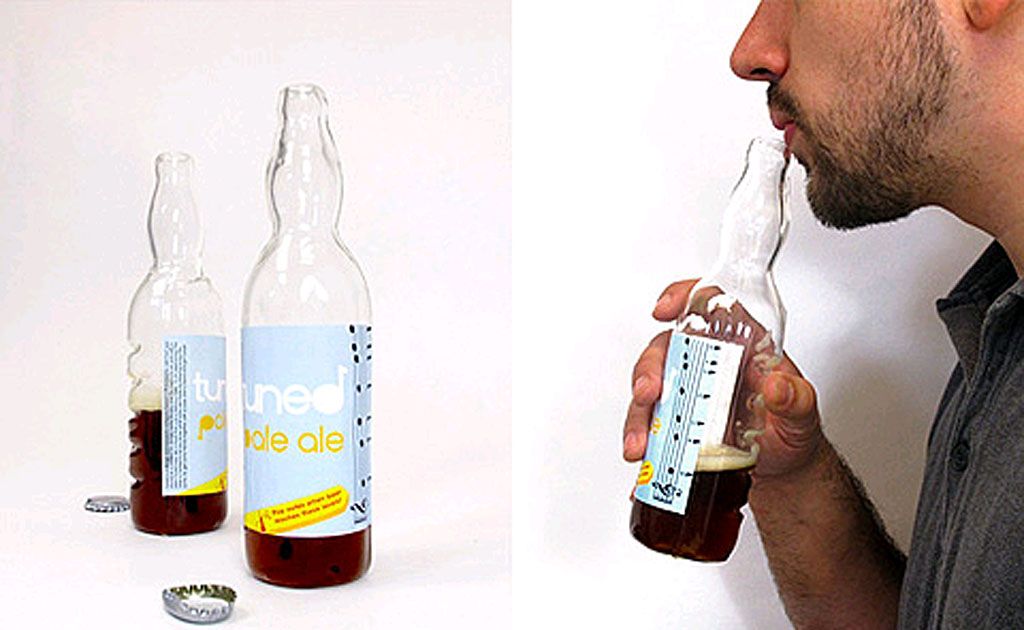 Tuned Pale Ale bottles feature markers indicating the notes produced by blowing over the neck of the bottle at various liquid levels, a notched side intended to be strummed with the cap, and an upside down holder which works as a tongue drum. Tuned Pale Ale bottles feature markers indicating the notes produced by blowing over the neck of the bottle at various liquid levels, a notched side intended to be strummed with the cap, and an upside down holder which works as a tongue drum.