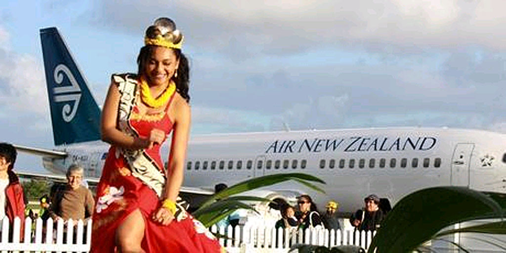 Maria Mitimeti, crowned Miss Niue, performs an impromptu dance for passengers at the airport. Maria Mitimeti, crowned Miss Niue, performs an impromptu dance for passengers at the airport.