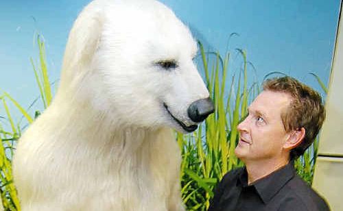 John Green, chairman of Bundaberg Rum, having a word and a handshake with Bundy R Bear. John Green, chairman of Bundaberg Rum, having a word and a handshake with Bundy R Bear.