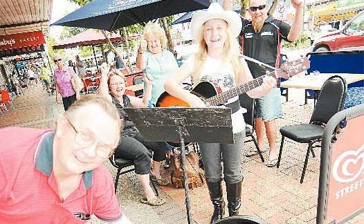 Maddison Stephens gets rousing support from Des Jensen, Michell Stephens, Beryl Gayton and Allan Stephens in the Bundaberg CBD. Maddison Stephens gets rousing support from Des Jensen, Michell Stephens, Beryl Gayton and Allan Stephens in the Bundaberg CBD.