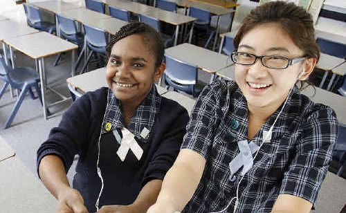 Yasmine Wilson and Queenie Lai use the iTouch application for language studies. Yasmine Wilson and Queenie Lai use the iTouch application for language studies.