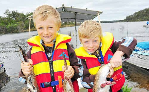Scott and Jake Sams hold 2.5kg of catfish between them which they caught at the Monduran Family Fishing Classic. Scott and Jake Sams hold 2.5kg of catfish between them which they caught at the Monduran Family Fishing Classic.