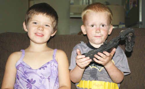 LITTLE HERO: Samarra McHale, 5, saved her family after her brother Tylar Bushell, 3, set fire to this boot with a lighter inside their Tanby Road home. LITTLE HERO: Samarra McHale, 5, saved her family after her brother Tylar Bushell, 3, set fire to this boot with a lighter inside their Tanby Road home.