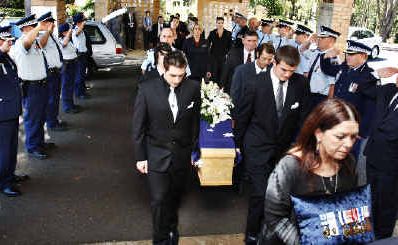 NSW Police Force form a guard of honour at the funeral of Richard ’John’ Blackler as his family enters the Lismore Memorial Gardens Chapel,Wednesday, October 27, 2010. NSW Police Force form a guard of honour at the funeral of Richard ’John’ Blackler as his family enters the Lismore Memorial Gardens Chapel,Wednesday, October 27, 2010.