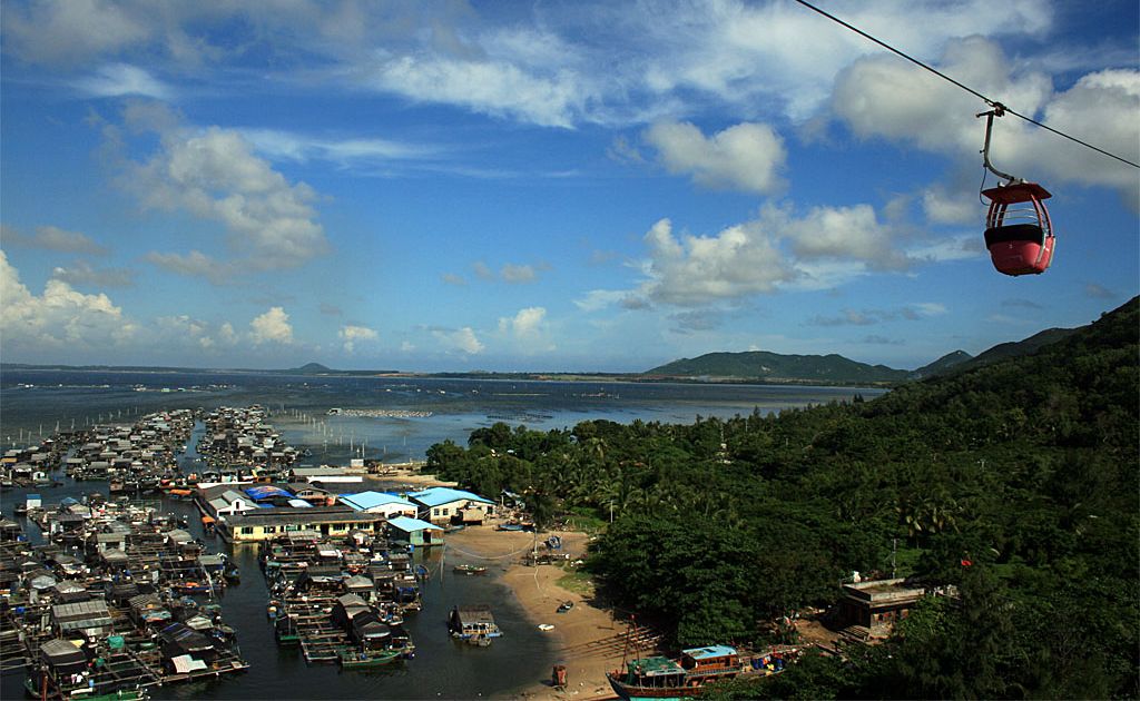 The cable car ride between Nanwen Monkey Island and Hainan Island gives an amazing view of the floating fishing villages. The cable car ride between Nanwen Monkey Island and Hainan Island gives an amazing view of the floating fishing villages.
