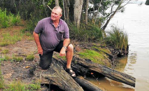 Joe Franz on his 400 acre Ringtail Creek property that he can’t do anything with. Joe Franz on his 400 acre Ringtail Creek property that he can’t do anything with.