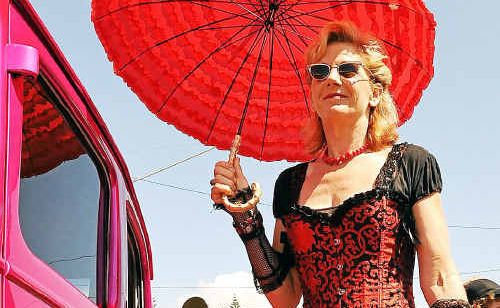Kathy Drake beside one of the hot rods during the Yamba event on Saturday. Kathy Drake beside one of the hot rods during the Yamba event on Saturday.