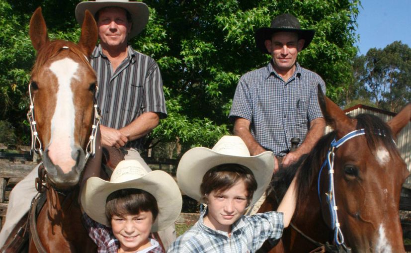 Saddling up for the show are Ian Grissell (left), Bangalow Show Society president Michael O’Meara and brothers Hamish, 10, and Jordan Guest, 12, of Bangalow. Saddling up for the show are Ian Grissell (left), Bangalow Show Society president Michael O’Meara and brothers Hamish, 10, and Jordan Guest, 12, of Bangalow.