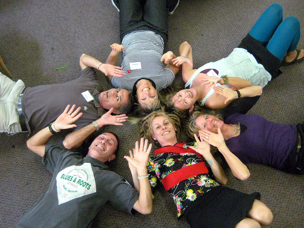 Putting their hands up to volunteer: Centre: (in black and red): Cherie Bromley BCC volunteer co-ordinator. Clockwise BCC volunteers: Tony Parker, David Dalton, Denise Lego, Heather Walker and Majida Steinfeld. Putting their hands up to volunteer: Centre: (in black and red): Cherie Bromley BCC volunteer co-ordinator. Clockwise BCC volunteers: Tony Parker, David Dalton, Denise Lego, Heather Walker and Majida Steinfeld.