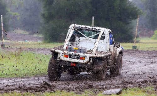 Shane Marsden gets his Nissan Patrol moving through the mud in the Dirt Sprintz at Project FMX on Saturday. Shane Marsden gets his Nissan Patrol moving through the mud in the Dirt Sprintz at Project FMX on Saturday.