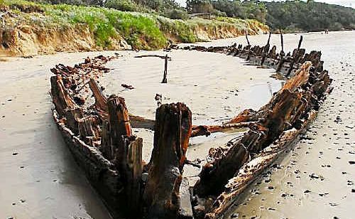 The remnants of the 310-ton Buster periodically reappears on Woolgoolga Beach. The remnants of the 310-ton Buster periodically reappears on Woolgoolga Beach.
