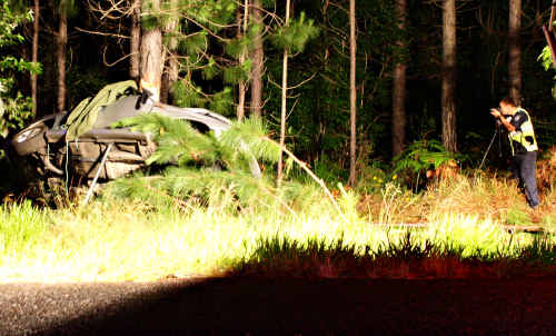 Police investigate the scene of a fatal crash on Beerburrum-Woodford Road. Police investigate the scene of a fatal crash on Beerburrum-Woodford Road.