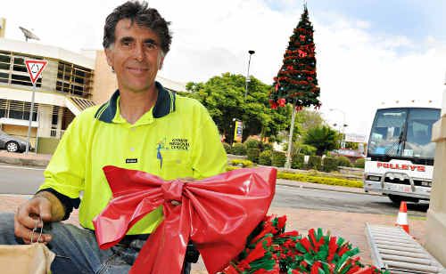 John Smolka from Gympie Regional Council puts the final touches to some Christmas decorations this week. John Smolka from Gympie Regional Council puts the final touches to some Christmas decorations this week.
