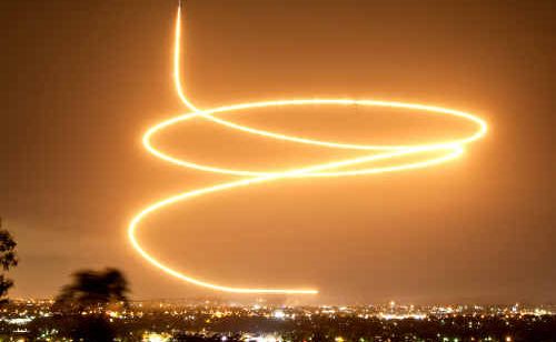 Phil Rettke’s time exposure photo of the final F-111 dump-and-burn over Bundamba on Saturday night. Phil Rettke’s time exposure photo of the final F-111 dump-and-burn over Bundamba on Saturday night.
