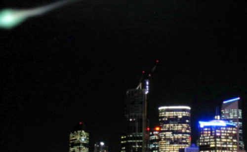 FIREBALL: This green fireball over Brisbane CBD was one of several shooting through the region, resulting in hundreds of UFO sightings. FIREBALL: This green fireball over Brisbane CBD was one of several shooting through the region, resulting in hundreds of UFO sightings.