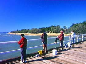 Fishing at Urangan Pier Fishing at Urangan Pier