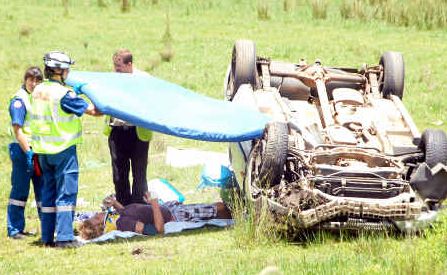 Recovering: A backpacker is treated after the accident at Swan Creek yesterday. Recovering: A backpacker is treated after the accident at Swan Creek yesterday.