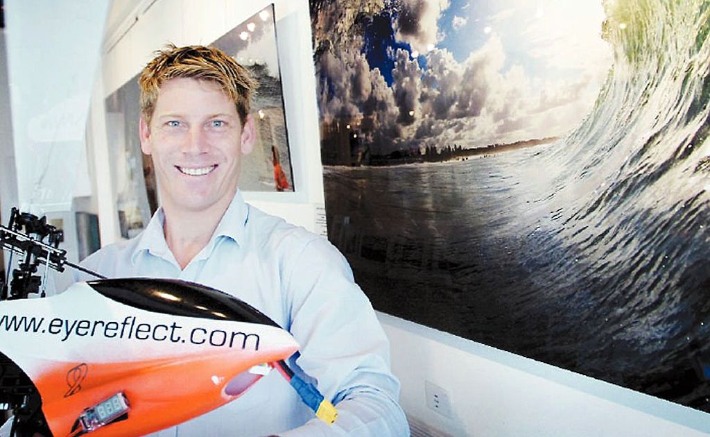 Eyereflect owner Craig Parry shows off his remote-controlled helicopter, which has a digital SLR camera attached to it. Eyereflect owner Craig Parry shows off his remote-controlled helicopter, which has a digital SLR camera attached to it.