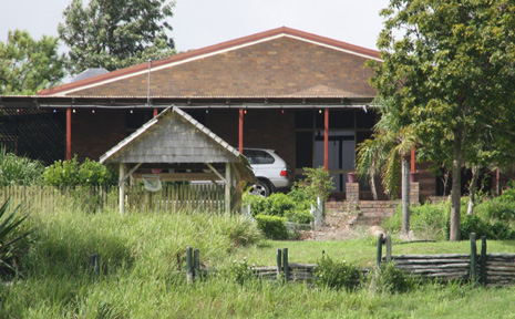 A crime scene is set up at this Tanby Road property this morning after the bodies of a man and woman, both believed in their 40s, were found by police yesterday. A crime scene is set up at this Tanby Road property this morning after the bodies of a man and woman, both believed in their 40s, were found by police yesterday.