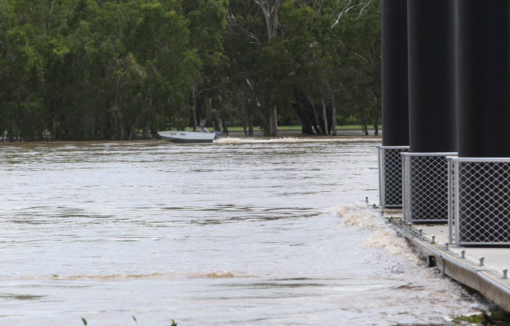 A boat heading upstream on the Fitzroy river. A boat heading upstream on the Fitzroy river.