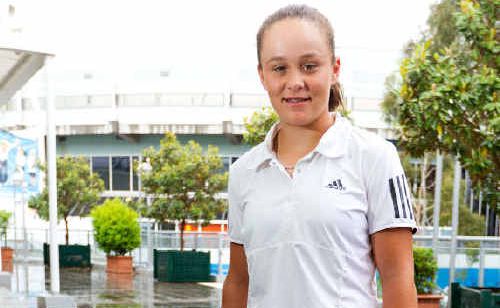 Ashleigh Barty outside Melbourne Park’s Rod Laver Arena where she hopes to contest the Junior Australian Open next month. Ashleigh Barty outside Melbourne Park’s Rod Laver Arena where she hopes to contest the Junior Australian Open next month.