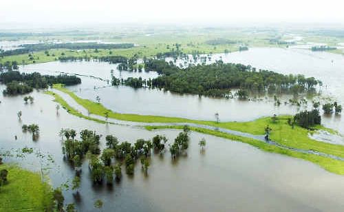 Extensive flooding west of Coraki after water from the Richmond and Wilsons rivers converges and moves down toward the sea. Extensive flooding west of Coraki after water from the Richmond and Wilsons rivers converges and moves down toward the sea.