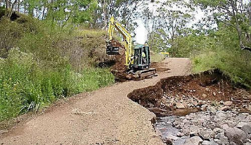 Council works on Charleys Gully Road at Freestone. Council works on Charleys Gully Road at Freestone.