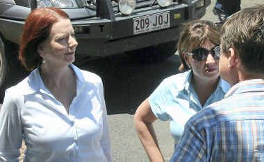 Julia Gillard and Anna Bligh arrive at Rockhampton Regional Council head quarters for a flood fill-in on New Years Eve 2010. Julia Gillard and Anna Bligh arrive at Rockhampton Regional Council head quarters for a flood fill-in on New Years Eve 2010.