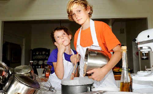 Brother Rowan Le Sueur, 12, and sister Zoe, 10, ham it up in the kitchen. Brother Rowan Le Sueur, 12, and sister Zoe, 10, ham it up in the kitchen.