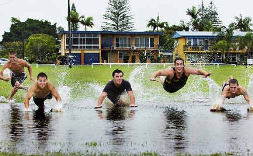 Jayden Flynn (left), Joel Roberts, Paul Turner, Jason Clarke and Nick Flynn, all from Ballina, enjoy the conditions in the town after recent heavy rainfall. Jayden Flynn (left), Joel Roberts, Paul Turner, Jason Clarke and Nick Flynn, all from Ballina, enjoy the conditions in the town after recent heavy rainfall.
