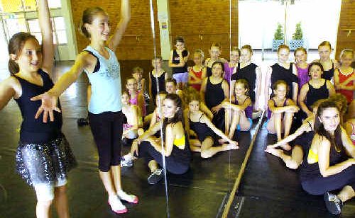 Dancing queen: Ina Hobson, 11, of Byron Bay and Jemma Cooper, 12, of Eltham with So You Think You Can Dance winner Talia Fowler. Dancing queen: Ina Hobson, 11, of Byron Bay and Jemma Cooper, 12, of Eltham with So You Think You Can Dance winner Talia Fowler.