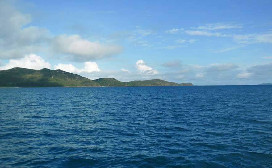 The sun shining over the Whitsunday islands. The sun shining over the Whitsunday islands.