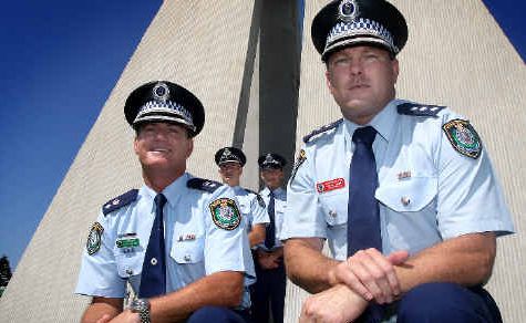 Police united: Tweed Heads Local Area Commander Supt Stuart Wilkins and Det Insp Shane Diehm with (rear, from left) Gold Coast District officers Chris Ahearn and Supt Paul Ziebarth. Police united: Tweed Heads Local Area Commander Supt Stuart Wilkins and Det Insp Shane Diehm with (rear, from left) Gold Coast District officers Chris Ahearn and Supt Paul Ziebarth.