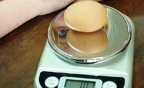 Maryborough's Alana Brown, 8, with the 107g egg Marge the hen laid. Maryborough's Alana Brown, 8, with the 107g egg Marge the hen laid.
