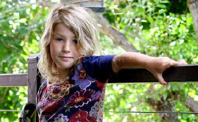 Still standing: Mia Merlini received 19 stiches in her legs after an attack by an unidentified marine animal. Still standing: Mia Merlini received 19 stiches in her legs after an attack by an unidentified marine animal.