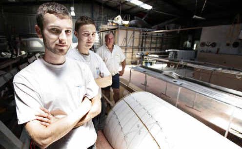 Ballina aircraft builder Howard Hughes (rear), of Australian LightWing, with French Air Force Academy students Benjamin Gans (front) and Fabien Moffat, who have been helping design and build the revolutionary LightWing SP-6000. Ballina aircraft builder Howard Hughes (rear), of Australian LightWing, with French Air Force Academy students Benjamin Gans (front) and Fabien Moffat, who have been helping design and build the revolutionary LightWing SP-6000.