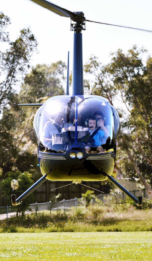 BACK TO SCHOOL: Fin Murray waves as he lands to start Year 6 yesterday. BACK TO SCHOOL: Fin Murray waves as he lands to start Year 6 yesterday.