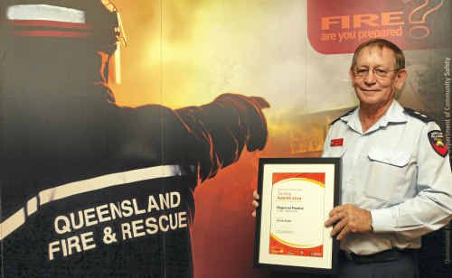 Station officer Trevor Kidd is rewarded with a Training Award at the Central Region Australia Day Awards on his last day of service. Station officer Trevor Kidd is rewarded with a Training Award at the Central Region Australia Day Awards on his last day of service.