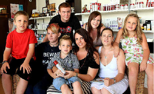 MEGAN and the Waters brood (front) Hunter, Jonathon, Finnlay, Kate, Makenzi and (back) Michael and Nicole. PHOTO: JOHN GASS D130517 MEGAN and the Waters brood (front) Hunter, Jonathon, Finnlay, Kate, Makenzi and (back) Michael and Nicole. PHOTO: JOHN GASS D130517